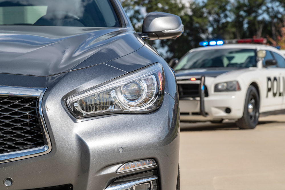 cop pulled up behind a sports car