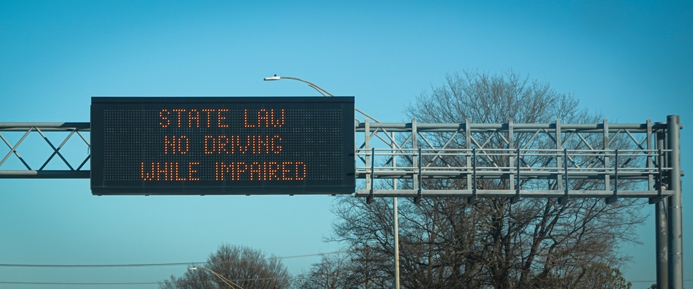 Flower Mound interstate sign warning motorists not to drive while impaired. Get a felony DWI attorney if you are facing charges.